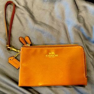 Brand new Coach leather brown wristlet authentic